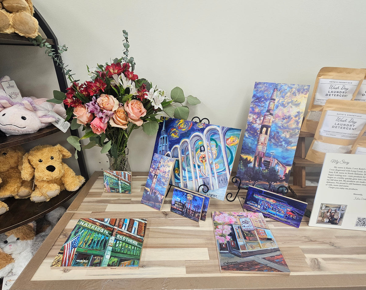 Collection of colorful postcard-sized and larger prints by artist Christina Wegman.
