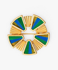 Decorative circular gold brooch with green and blue feather inlay design on a white background