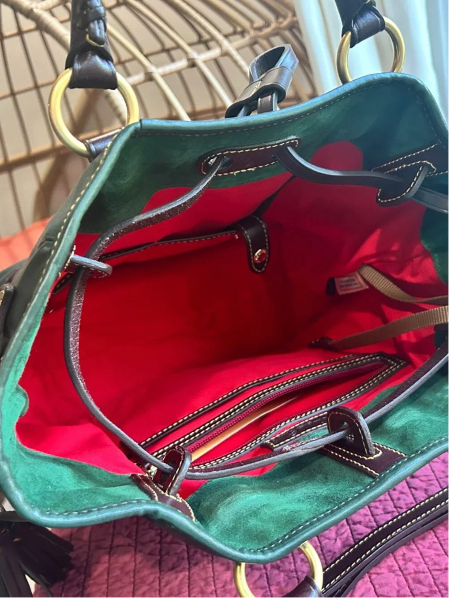 Green handbag with red interior 
