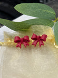 Red bow studs