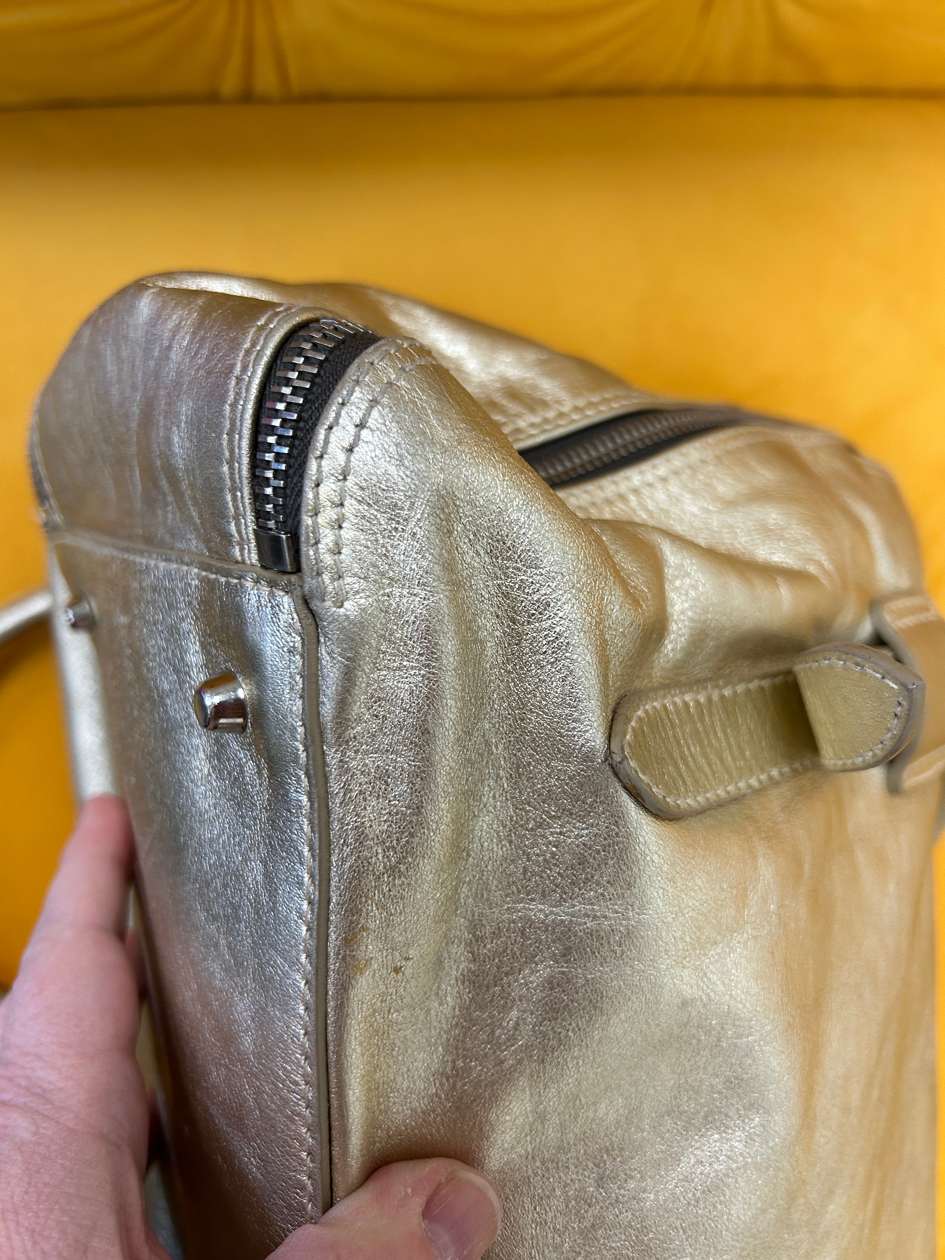 Metallic gold Furla bag