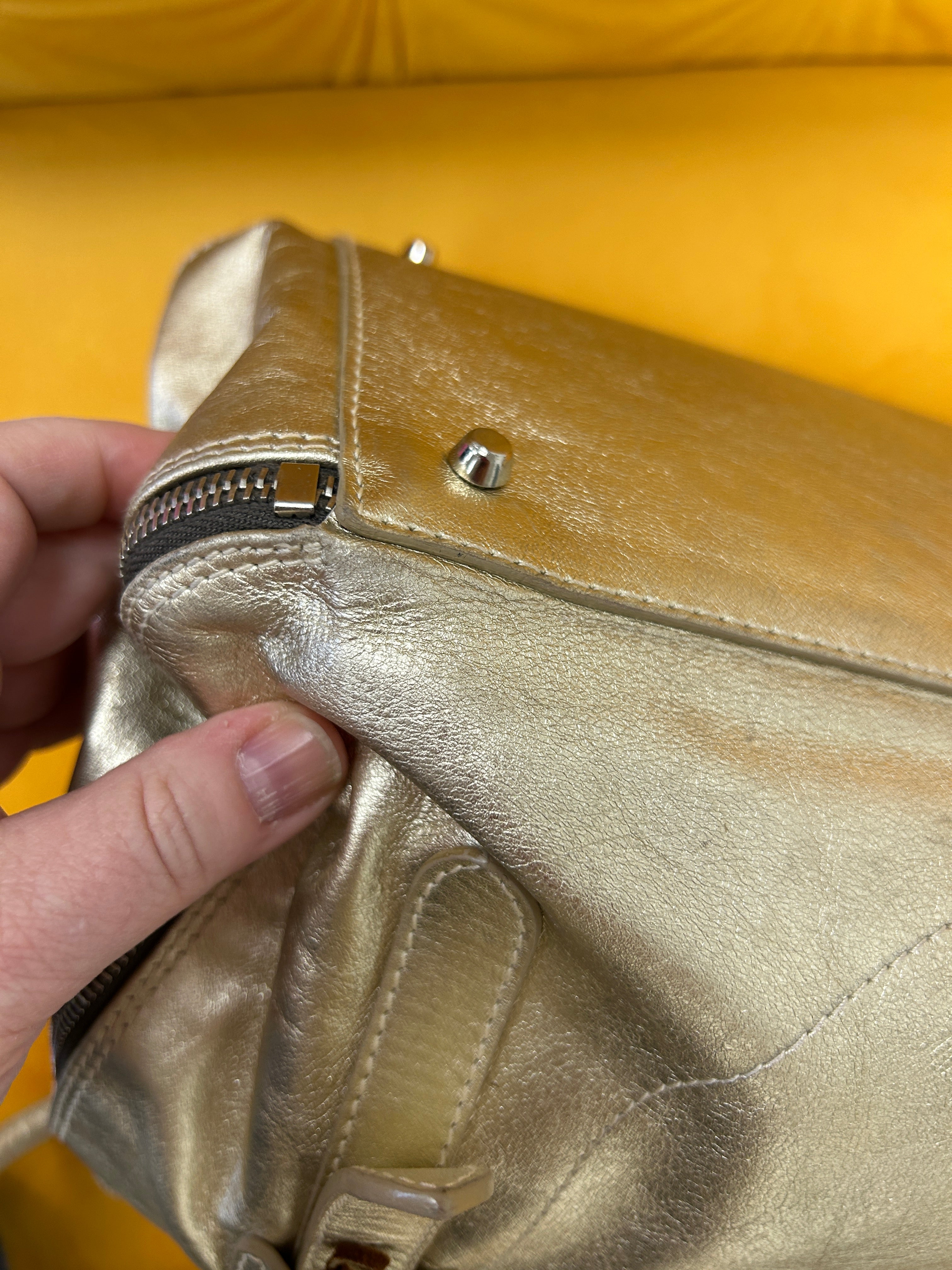 Metallic gold Furla bag