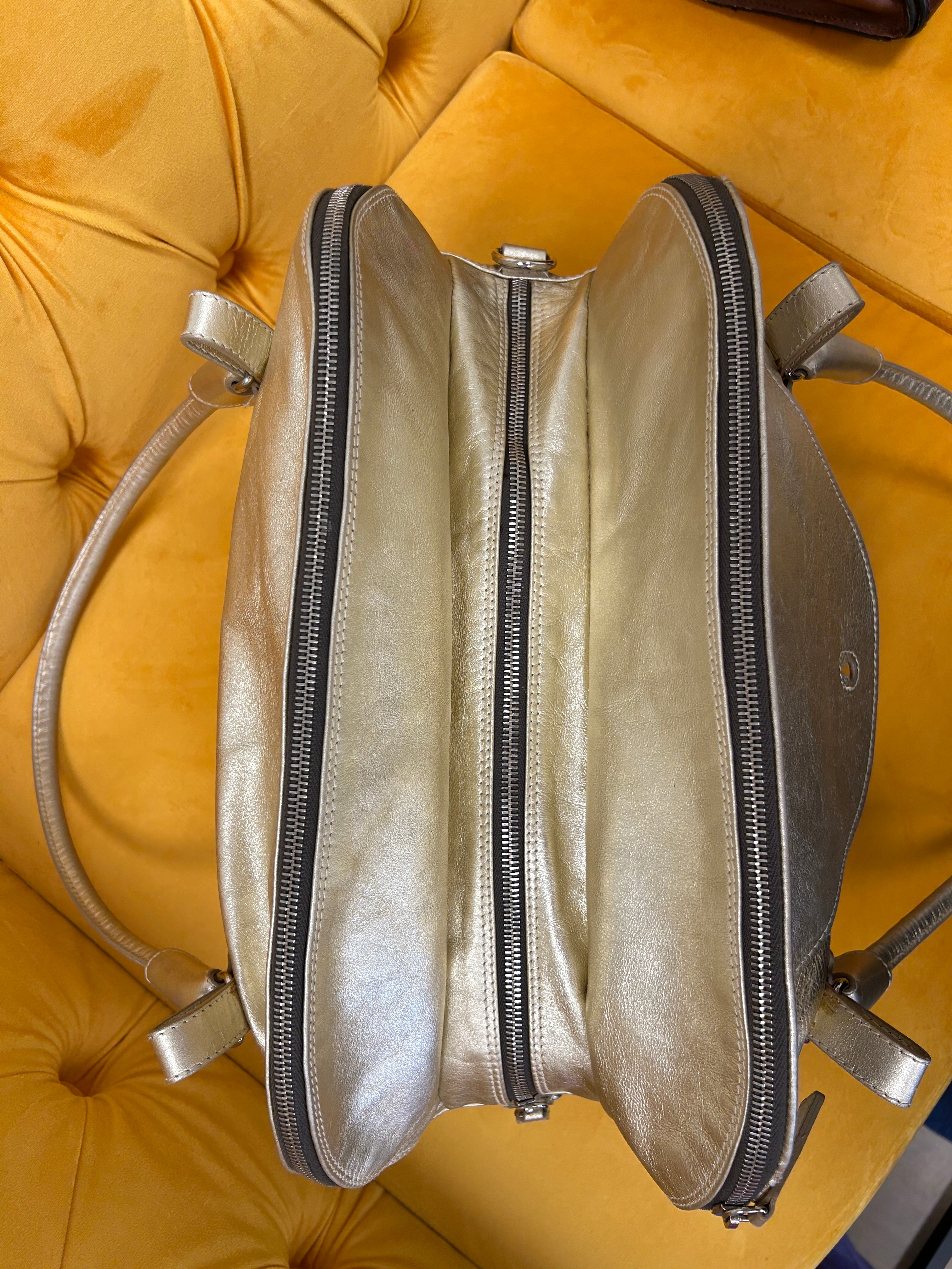 Metallic gold Furla bag