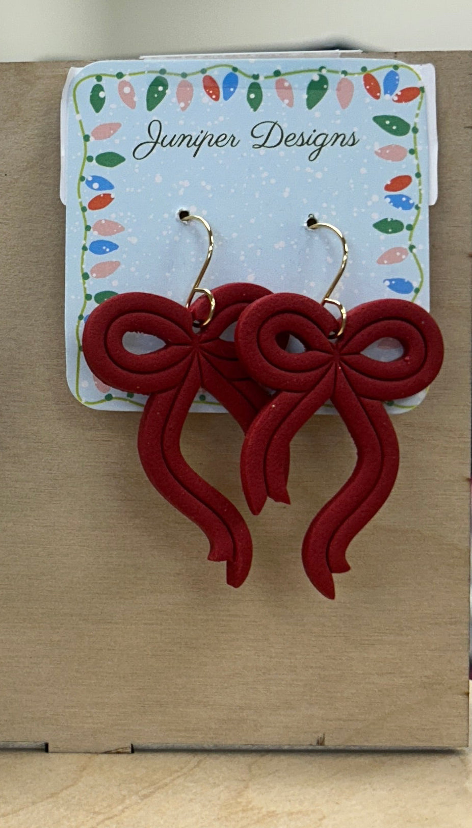 Large red bow earrings