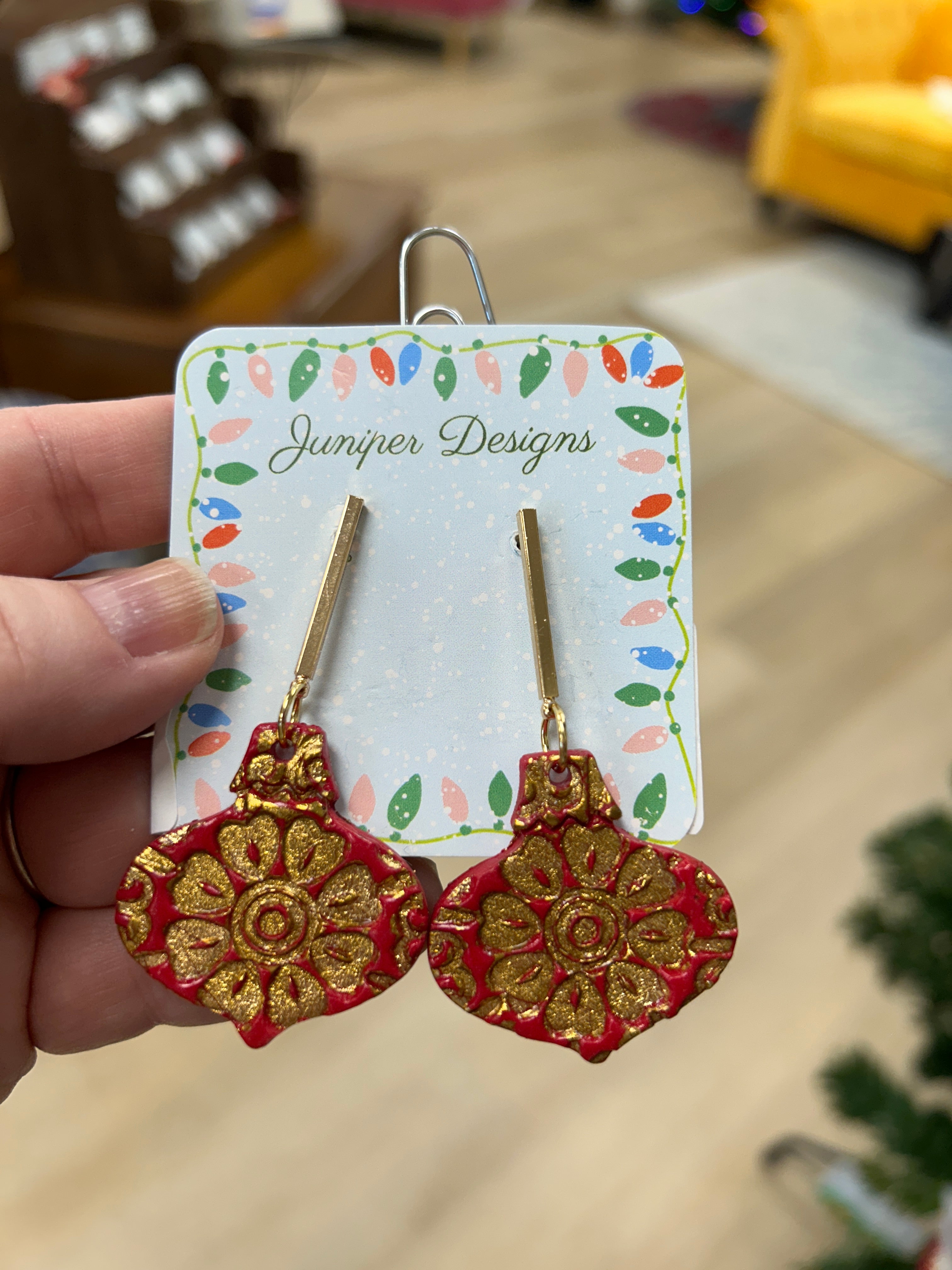 Dangling ornament earrings