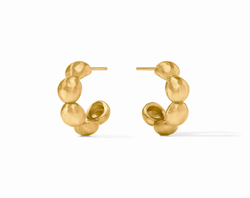 Gold hoops with domed ball shapes on white background