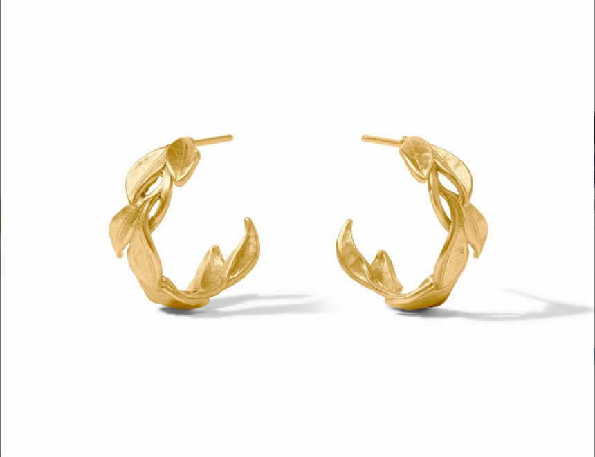 Gold hoops with leaves on white background