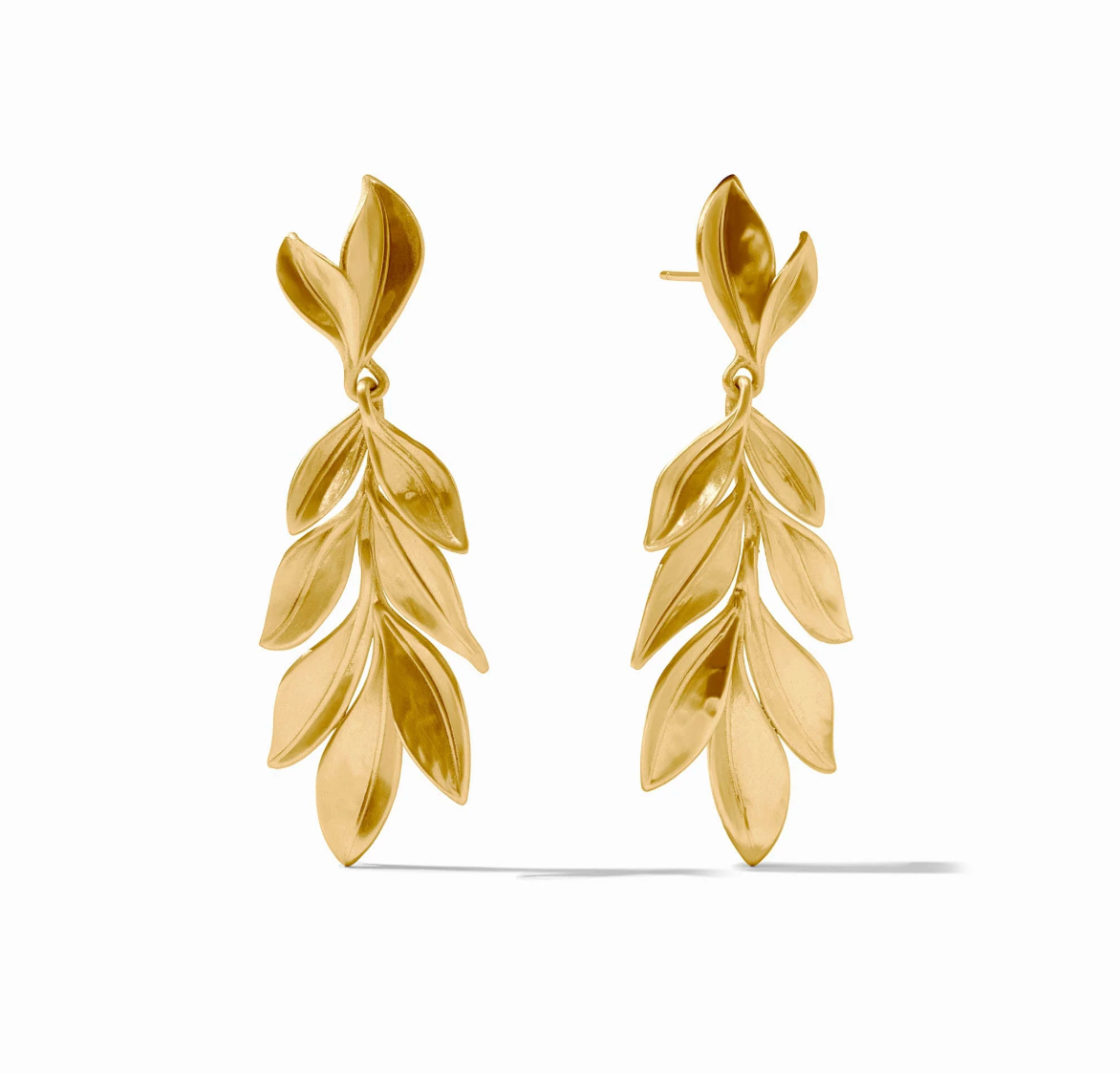 Long earring with gold leaves on a white background