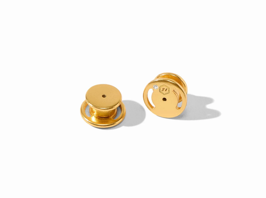 Pair of gold earring backs featuring Julie Vos hallmark.