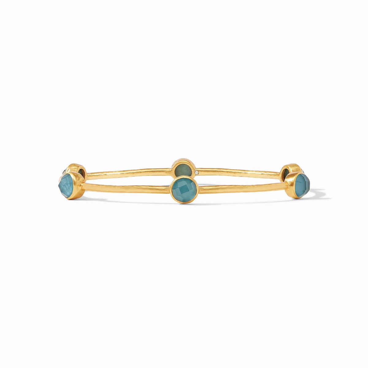 Gold bracelet with turquoise stones on a white background
