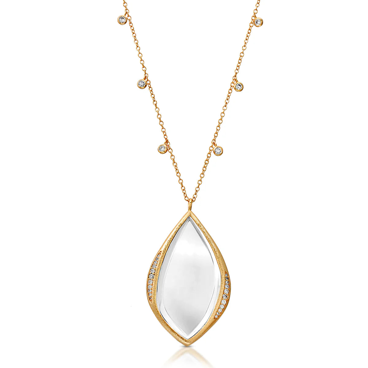 Gold necklace with a teardrop-shaped monocle pendant and diamond accents on both chain and pendant on a white background
