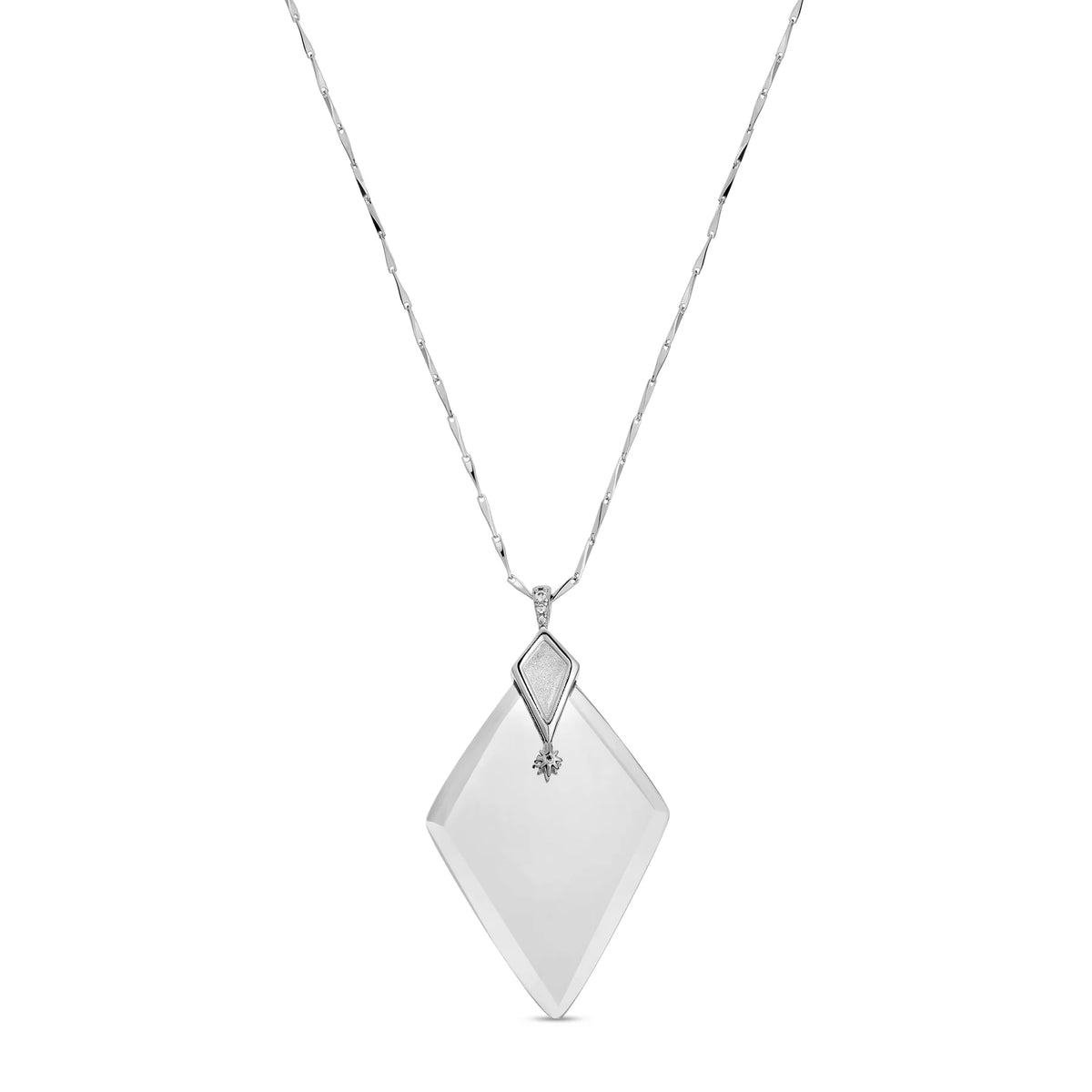 Silver necklace with a diamond-shaped monocle pendant on a white background