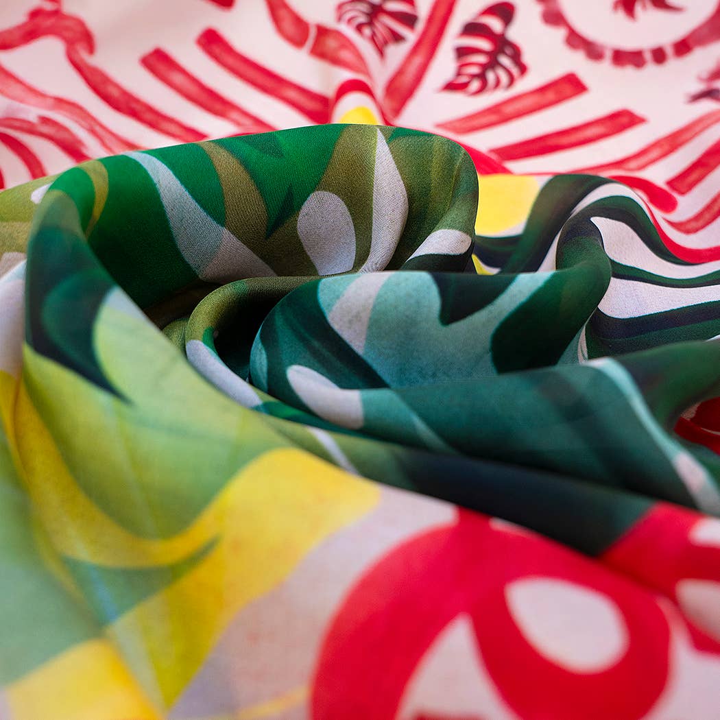 Close-up of colorful fabric with tropical leaf patterns