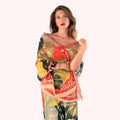 Woman wearing a colorful patterned scarf on a white background