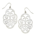 Silver filigree earrings on a white background