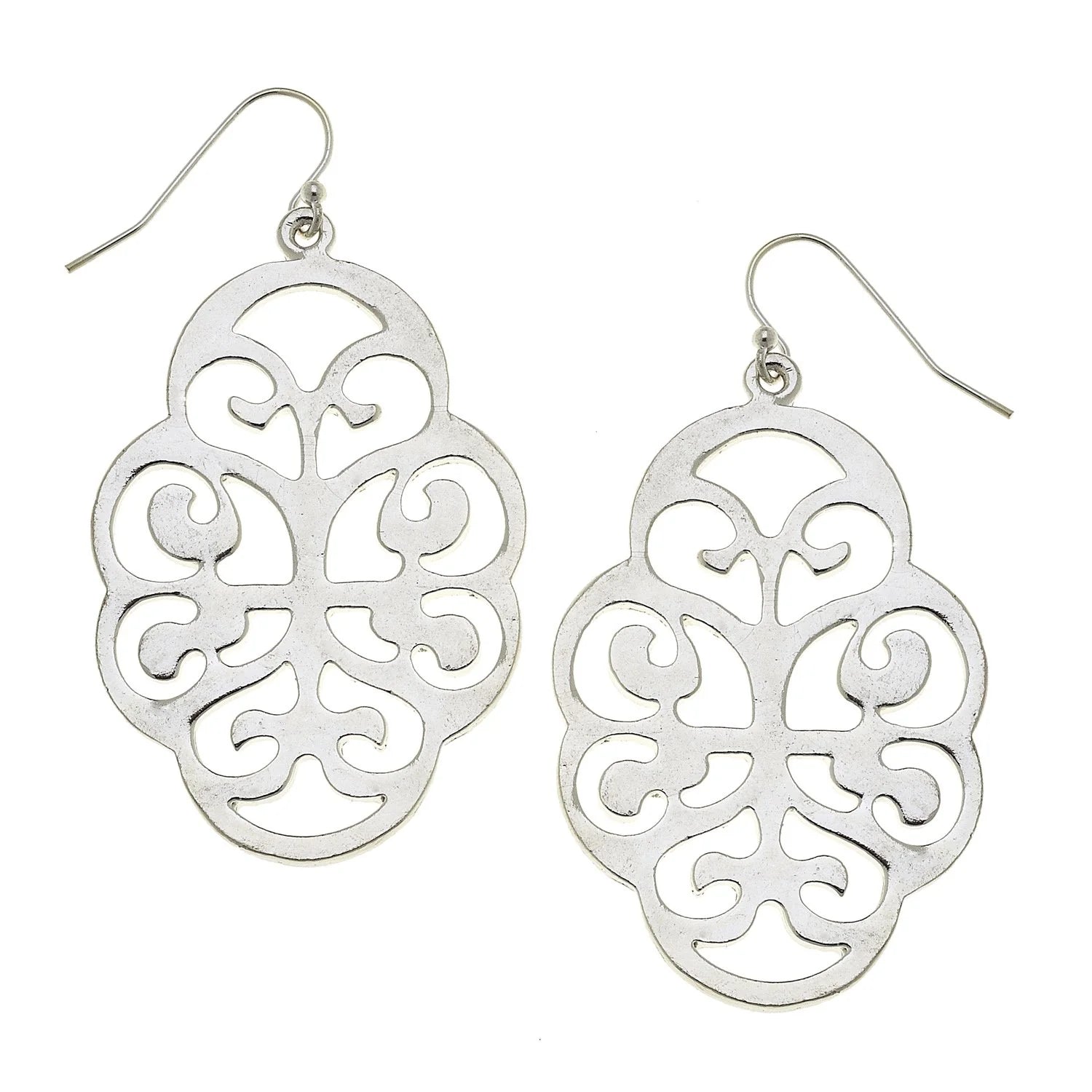 Silver filigree earrings on a white background