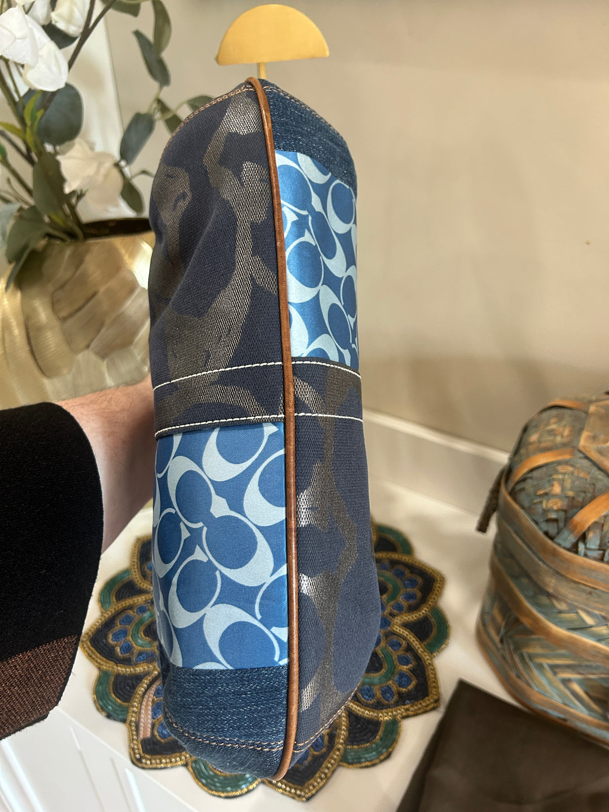 Bottom view of a patchwork bag in brown, blue