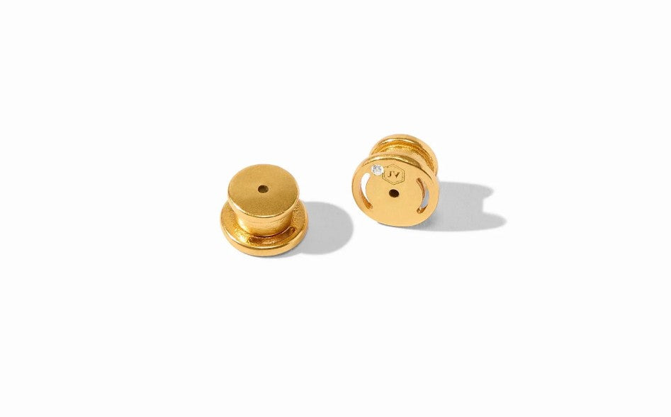 Pair of gold earring backs showing the Julie Vos hallmark.