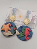 Seascape Dangle| Paradise Resort | Juniper Skies